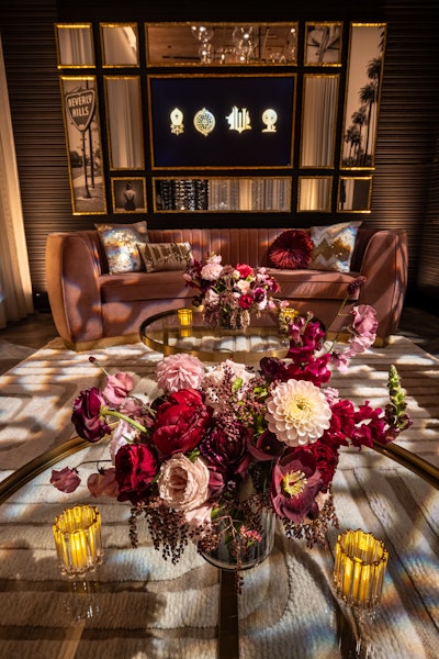 JWang Consulting opted for a sophisticated and stylish look created with accents of burgundy, pinks, smoky black, and hints of gold. The Petal Workshop handed florals, while furniture rentals came from Town & Country Event Rentals, FormDecor, and Blueprint Studios.
