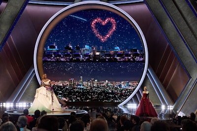 The show opened with a headline-grabbing performance by Wicked's Oscar-nominated stars Ariana Grande and Cynthia Erivo, featuring songs from The Wizard of Oz and The Wiz before ending with a rendition of 'Defying Gravity' that earned a standing ovation from the audience.