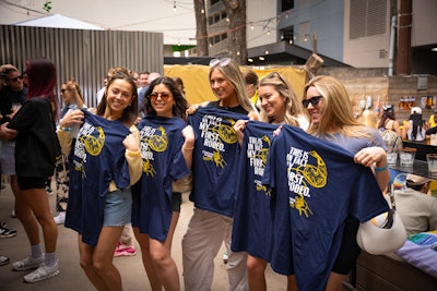 The strategy worked, baiting 3,500 attendees to this first-time event over two days. Abby Peterson, associate creative director and brand activation specialist at Connelly Partners, added, “We transformed the venue, painting the bar yellow, building a massive ship’s helm entry, and hosting 16 live music acts. The crowds were constant, enjoying photo ops, social challenges, and custom retro-style merch that all tied the seafood shack aesthetic with a playful fusion of Austin’s vibrant energy.”