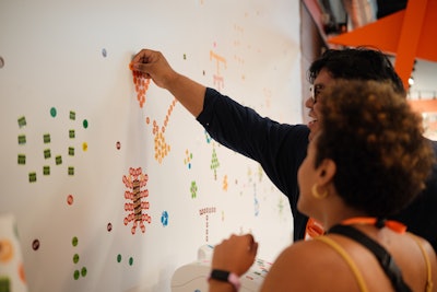 The WMOA played homage to the chain’s 75th anniversary, featuring imaginative paintings and nail art. The Whataburger Day Dot Room allowed fans to cover a white restaurant interior with bright Whataburger “Day Dot” stickers.