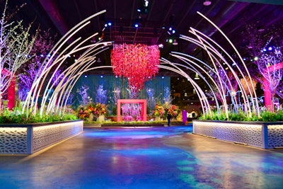 This year's Entrance Garden by GMRdesign was titled Future Florentia, and it aimed to embody the vision of flowers as symbols of the future. Attendees entered through a glowing arch tunnel made of 30 LED light arcs before standing under a circular, botanical chandelier made of 450 strands of flowers. 'The Entrance Garden is the first impression of the show theme and sets the mood for the full show experience,' says GMRdesign founder Gary Radin. 'Each year, we look for unique ways to showcase plants and flowers in a dynamic and immersive environment. Given the long history of the show, returning guests expect a 'wow' when they enter.'