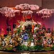 Robertson’s Flowers & Events scored the second-highest amount of points in the Floral category with its exhibit, 'Tending Our Roots.' The design takes inspiration from the proverb, 'One generation plants the trees; another gets the shade.” The 'tree of life' figure in the center is drawn from a real-world park in Singapore focused on sustainability and is meant to symbolize the efforts of the current generation in planting seeds for a future filled with environmental benefits. Beneath the canopy is a cityscape 'where our roots connect us through a common weave under the promise of a shared sunrise,' the Robertson's team shared on social media.