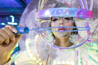 For the Solana event, 'instead of a static party, we created an ecosystem where guests could see the blockchain come to life around them,' she says.