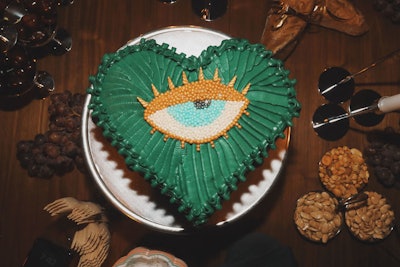 Woody worked with La Macaron Guy for these decadent cake displays. 'Each one was a unique, sculptural piece that blurred the line between dessert and art,' she says. 'They became a centerpiece of the night, sparking conversation and adding to the sense of indulgence and whimsy I wanted guests to experience.'