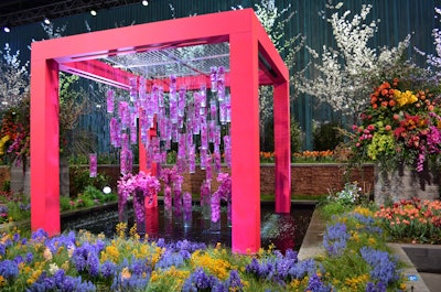 The scene also featured 25 white Yoshino cherry trees and this water feature, which released soft rain streams around a floral installation.