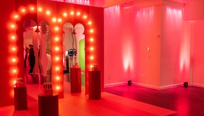 Naturally, glam stations at beauty brand activations are a surefire way to engage attendees and potential consumers. In 2023, Selena Gomez's Rare Beauty tapped Sunset Studios to transform white-box venue Lavan 541 in New York City's Chelsea neighborhood into a dreamy respite, decked out in pink and red hues. Attendees could stop by this glam station to pose with the products and snap photos in lip oil-shaped mirrors. See more: Selena Gomez's Beauty Brand Blossomed in the Big Apple Thanks to This Experiential Agency