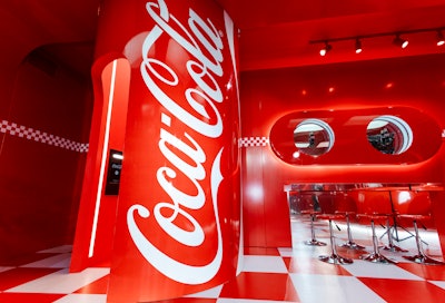 At the Coca-Cola activation, a photo booth was in the shape of a massive Coca-Cola can.
