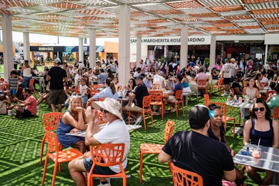 This year’s Open offered more shaded areas, which allowed guests to relax away from the direct sunlight and enjoy the campus for longer—including this unique lounge where the patterned ceiling worked with natural light to project funky patterns on the turf.