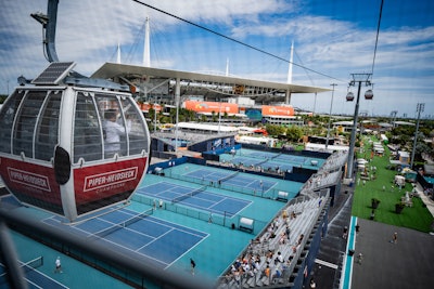 Guests could buy tickets to toast and ride the Piper-Heidsieck Sky View gondola with signature red branded cabins, which offered sweeping views of the entire Miami Open campus.