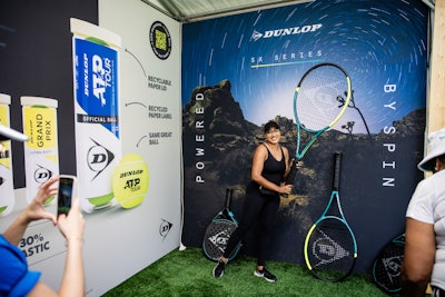 Dunlop demonstrated the world’s first courtside smart kiosk, which provides players with instant access to premium equipment. Guests posed with oversize rackets after checking out the technology.