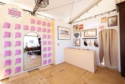 Guests could also visit a custom leather stamping station, where they personalized leather key chains with their initials, names, or phrases. A limited-edition Stagecoach Sports Sling in Berry was available for purchase on site; winners of the rodeo games also took home the exclusive sling as a prize. (With every sling purchase, while supplies lasted, visitors received complimentary Western-inspired accessories and branded water bottles.)