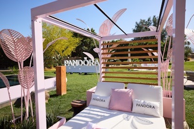 At the Pandora Charm House, the brand's signature pink showed up just about everywhere. Pandora pink tiles replaced the original outdoor flooring, while custom-fabricated daybeds, branded umbrellas, and towels and pool floats also leaned into the shade.