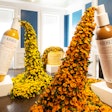 For a Kiehl’s event, Stark turned larger-than-life calendula products into striking art pieces, which were overflowing with flowers as a nod to the brand's natural ingredients.