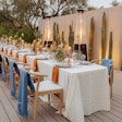 The welcome dinner took place at a communal table flecked with decor in desert-inspired hues. The Valley handled furniture rentals, while Let’s Bash provided tabletop rentals.