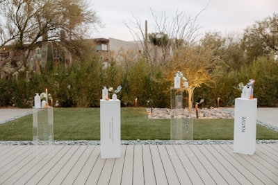 On the first evening, guests entered the welcome reception via a walkway decked with artful displays of the new products. The body washes were arranged on branded pedestals amid candles and floral arrangements. Dang Fine Rentals provided branded rentals.