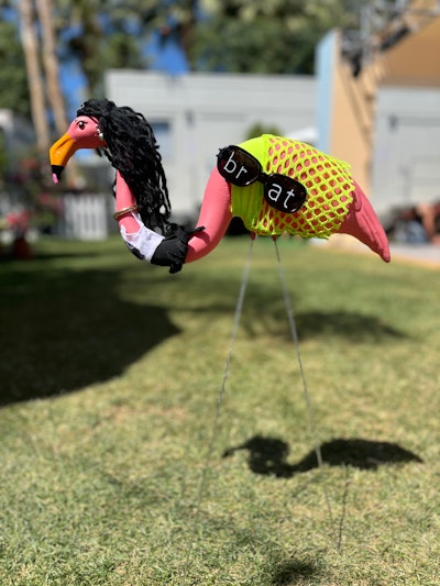 At YouTube's backstage artists' area, decor details included a flock of 'flamingo-fied' versions of Coachella headlining artists by @palmeriart.