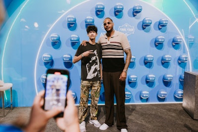 Fans were also able to meet NCAA coaches and former players, as well as snap photos with the AT&T blue basketball wall and a mini Melo statue from the company’s advertising spot.