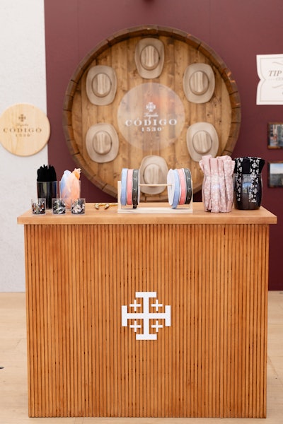 Guests could customize cowboy hats with branded ribbons, bandanas, and pins while enjoying custom cocktails.