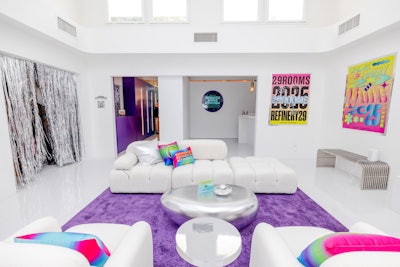 The Lunar Lounge featured a cosmic vibe with a vibrant color palette of pinks, purples, oranges, and blues.