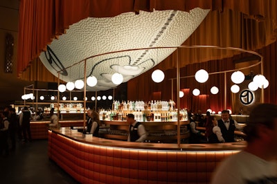 At a Stark-designed Super Bowl event for Uber, a giant football took center stage, creating a unique ceiling moment.