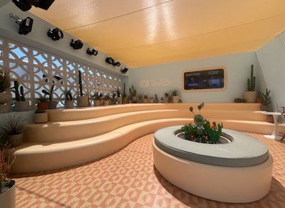 The front of the activation space featured a sprawling lounge, equipped with fruity popsicles and cold eucalyptus towels to help visitors beat the heat, while the YouTube Multiview live streamed onstage performances in real time.