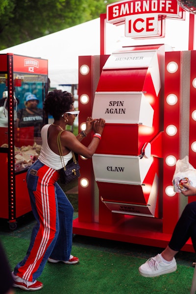 While playing, fans sipped on Smirnoff Ice Smash Pink Lemonade and Smirnoff Ice Smash Screwdriver.