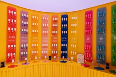 In the Sol de Janeiro activation, a bold color scheme created a unique product display. The vibrant wall of fragrances invited scent layering, personalization, and play.
