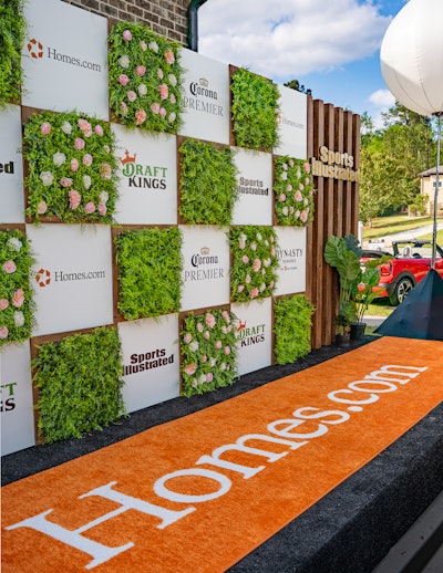 Augusta After Dark was presented by Homes.com, which rolled out the red (or should we say orange?) carpet for 500 invited guests to snap a photo before heading into the exclusive estate that served as the evening's venue.