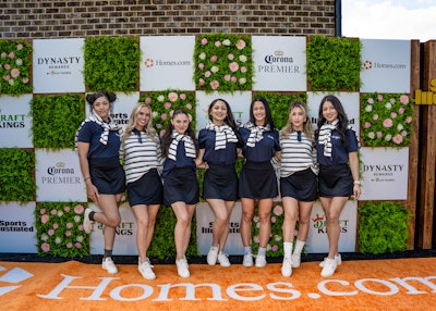 On-site staffers were decked out from head to toe in a “golf chic” outfit consisting of Authentic’s own portfolio of brands, including Reebok, Nautica, IZOD, and Lucky Brand.