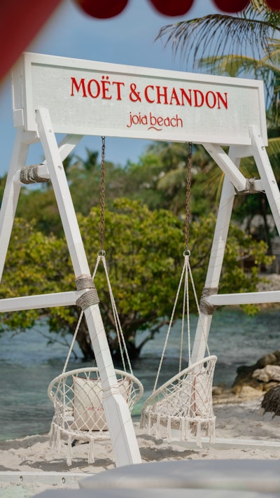 Additional moments included a Moët-branded swing set with hand-wrapped rope and macramé seating, creating a photogenic moment that felt at home in the beach environment. 2R Creative led the creative direction, fabrication, and installation, working closely with Moët & Chandon to unify the look and feel of the space. Designed with longevity in mind, the entire build was crafted to withstand outdoor conditions while maintaining a polished, luxurious feel throughout the multiweek run. (Want to see more highlights from the Formula 1 Crypto.com Miami Grand Prix? Check out our roundup, here.)