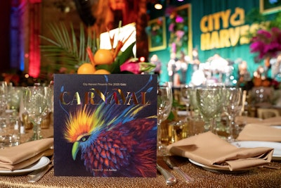 The evening's program featured a colorful bird and gold foil.