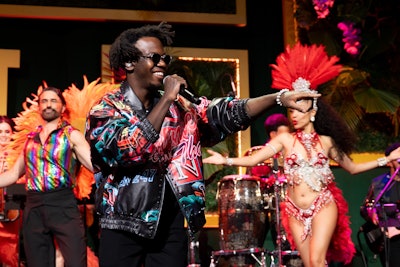 'On the Move’s dozens of singers, musicians, and dancers—all in bright, sparkly costumes—turned the night into a big, big party,' Boroff added.