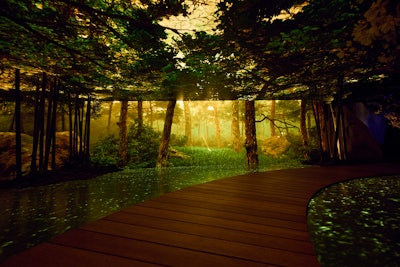 Upon entering, guests are guided by Paltrow’s narration through a symbolic Korean forest—a maze of lush greenery, rocky formations, and sensory elements inspired by the Sobaek Mountains. The experience blends digital and physical environments through LED visuals, textured pathways, ambient sounds, and botanical scents. Visitors are gradually led to a tranquil meditation meadow anchored by a reflective pool, where they can pause for quiet reflection and mindfulness.