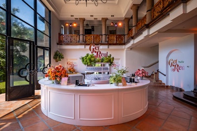 'Every event detail was designed to encourage cross-pollination and content capturing for guests, talent, and influencers,' Ashton says. 'Where else could you have Vanna White, Khloé Kardashian, and Spencer Pratt together in one space than the Get Real House?'