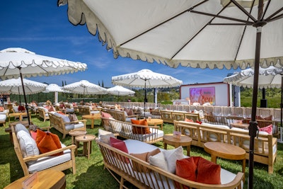 The main programming of the event was a one-hour presentation hosted on the lawn. The presentation featured moderated Q&As with talent like Alex Cooper, Khloé Kardashian, and Scott Disick.