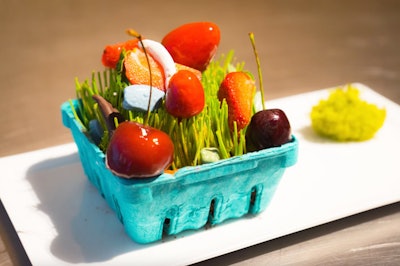 At a fundraiser for Advocate Illinois Masonic Medical Center, caterer Blue Plate created a five-course dinner inspired by how a child with autism experiences the world. One course was called 'Things Aren’t Always As They Seem.' It was meant to surprise the guests, with cheese molded to resemble summer fruits, pumpernickel “dirt,” chocolate-covered “grasshoppers,” edible “pebbles,” and grilled bread.