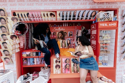 The pop-up brought the magazine to life through live hair demonstrations by local stylists, along with immersive moments designed to honor the legacy, creativity, and versatility of Black hair.