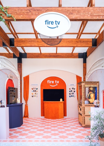 This immersive, creative approach to storytelling continued throughout the space, with whimsical brand expressions woven into the experience—including a slushie bar that delivered cool drinks and content from Prime Video; custom perfumes embodying the personalisation of AWS; and a mechanical fortune teller station for Amazon devices, complete with custom-made fortune cards.