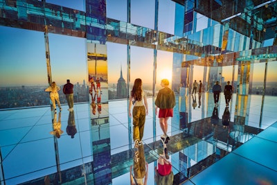 SUMMIT One Vanderbilt has launched SUMMIT Events, a new private event space in collaboration with Michelin-starred chef Daniel Boulud’s catering venture, Cuisine Boulud New York, offering an elevated experience atop one of Midtown Manhattan’s most iconic observatories. Opening July 1, the striking new venue is a 72nd-floor space with panoramic skyline views, mirrored interiors, and direct access to the immersive, multifloor SUMMIT One Vanderbilt attraction. It seats 100 or holds 120 for receptions.