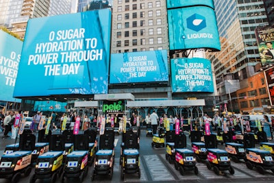 At 4 p.m. on the dot, the screens were refreshed to display I.V. O’Clock; at the same time, 50 Liquid I.V. delivery robots (from Kiwibot) were deployed, giving out reusable water bottles, Liquid I.V., and directions to Hope Hydration stations steps away for clean water.
