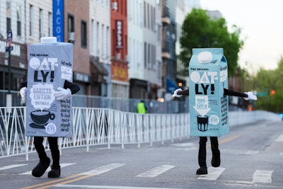The brand also teamed up with local Dayglow Coffee to treat runners’ “better halfs” to free Oatmilk Lattes made with Oatly Barista Edition. And after crossing the finish line, runners celebrated with Oatly at the Half-A-Finish Area, where brand ambassadors handed out free swag and post-race recovery smoothies made with Oatly. Each “half-a-gym bag” (aka fanny pack) came stocked with a sticker, pin, and a coupon for half off their next Oatly purchase. Oatly mascots brought the hype at the starting line, halfway point, and finish area, cheering runners on every step of the way. Overall, the campaign generated more than 25,000 in-person impressions and nearly 10,000 samples/giveaways distributed.