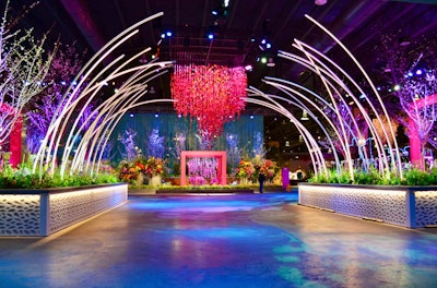 At the 2025 Philadelphia Flower Show, held in March, the Entrance Garden by the Pennsylvania Horticultural Society in partnership with GMRdesign was titled Future Florentia; it aimed to embody the vision of flowers as symbols of the future, while also creating a 'wow' moment and setting the mode for the full show experience. Attendees entered through a glowing arch tunnel made of 30 LED light arcs before standing under a circular, botanical chandelier made of 450 strands of flowers. See more: 11 Futuristic Floral Designs From the 2025 Philadelphia Flower Show