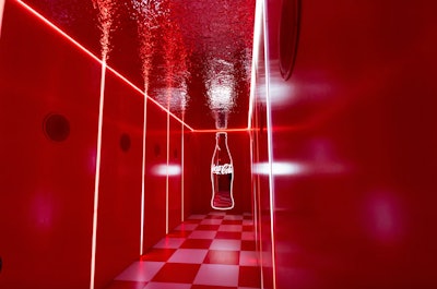 Coca-Cola returned to Coachella in April 2025 to celebrate its 'Real Magic' campaign with the Coca-Cola Pop Shop activation, designed and produced by Crown + Conquer. Inspired by the iconography of Coca-Cola, the activation reimagined the classic soda fountain with a modern twist. As guests entered, they were immediately immersed in the rich history of the brand by walking through a 'soundsorial' corridor featuring the sounds of fizzing bubbles, pouring, and popping open a Coke. See more: Coachella 2025: The Most Talked-About Brand Moments and VIP Happenings
