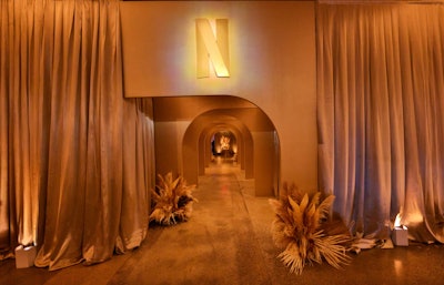 Another Netflix favorite came from its 2022 Emmys party, where Best Events transformed a raw studio space into a posh tone-on-tone affair layered with shades of cream, Champagne, and gold. Draping was designed by Dazian.