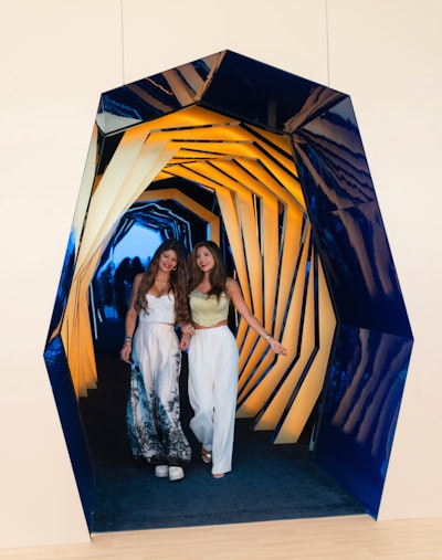 During Art Basel 2024, Chase cardholders could purchase tickets to attend the Sapphire Presents: Miami Art Week Exclusive Concert inside SCOPE Art Show. An artsy entry tunnel that evoked the Chase logo was a popular photo spot for guests. See more: The Best Events, Activations, and More From Art Basel Miami Beach and Miami Art Week 2024