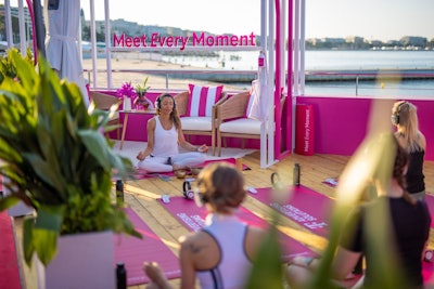 At the heart of the space was Maison Magenta, a seafront terrace with great views, branded photo moments from the brand's “Meet Every Moment” campaign, and a curated cocktail bar experience. The terrace also hosted Connected Yoga sessions, using wireless headphones for deep sensory immersion.