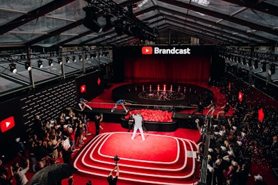 Held at Lincoln Center's David Geffen Hall in May, the 20th anniversary-themed YouTube Brandcast was hosted by popular creator Brittany Broski. A massive outdoor tent hosted a red-carpet preshow, live second stage broadcast segments, and an after-party. The event culminated with a 20-minute set from Lady Gaga.