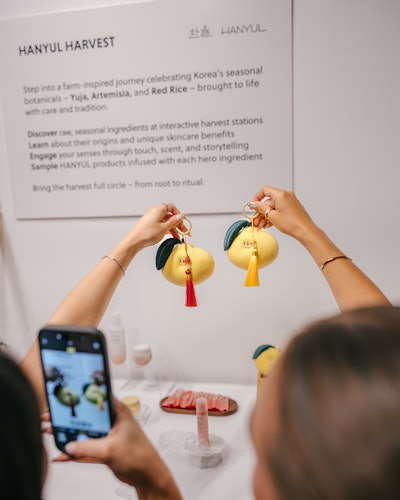 Interactive harvest stations let attendees explore ingredients and learn their skincare benefits through a playful, hands-on game—with a small prize for their discovery.