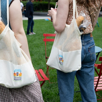 Visitors received branded tote bags that they could fill with samples from the booths.