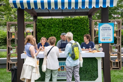 Visitors could sample bite-size Wisconsin-sourced cheeses like the Emporium Selection Hot Honey Gouda and Double Smoked Cheddar.